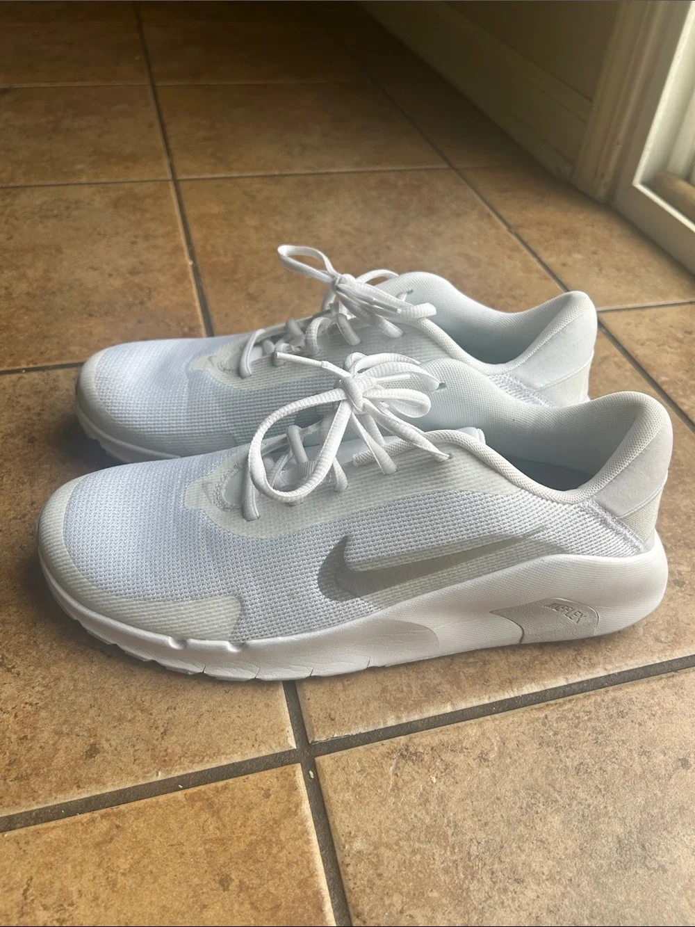 Nike Women’s White Mesh Sneakers with Silver Swoosh
